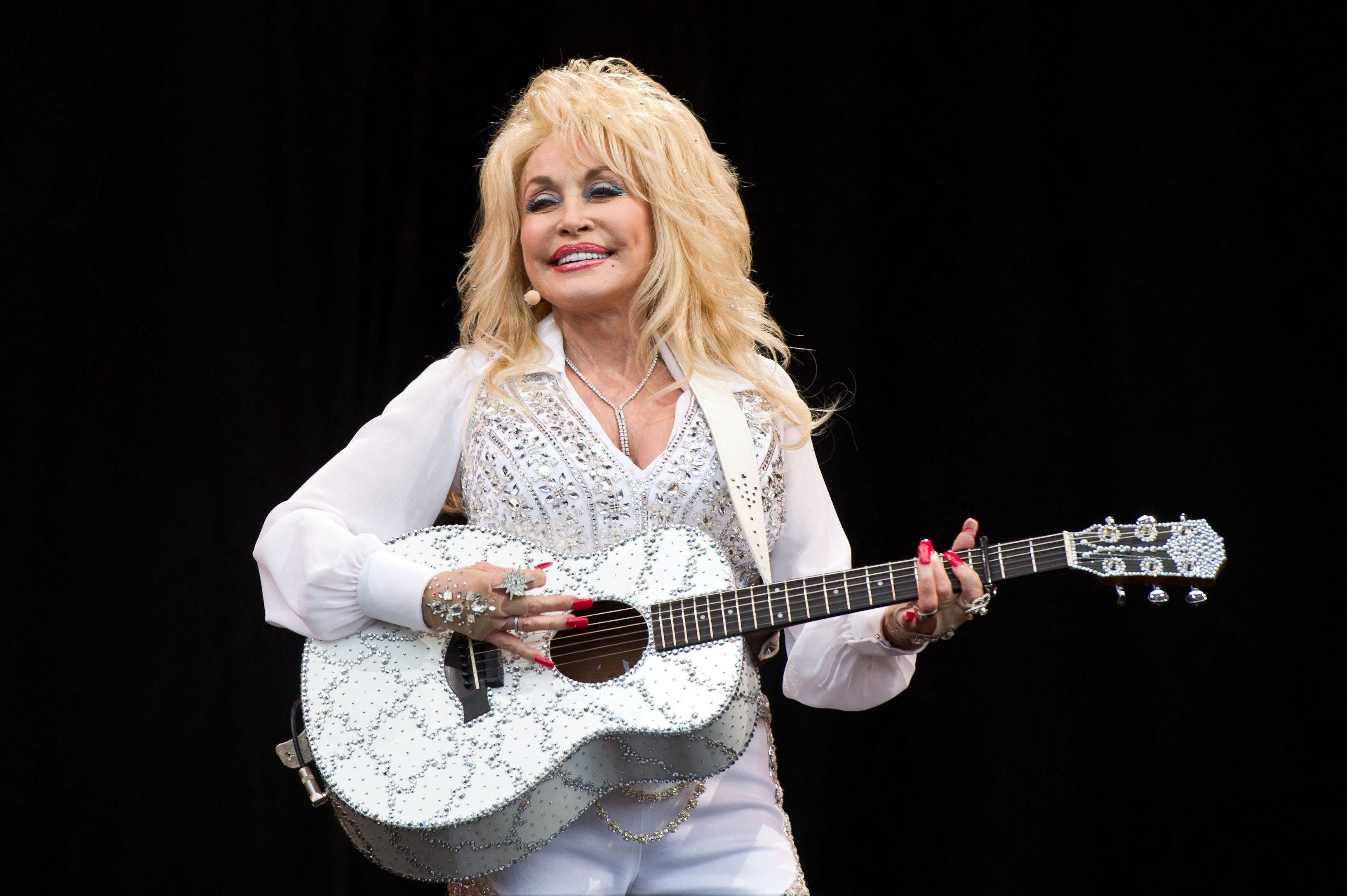 Parton performing at Glastonbury in 2014 