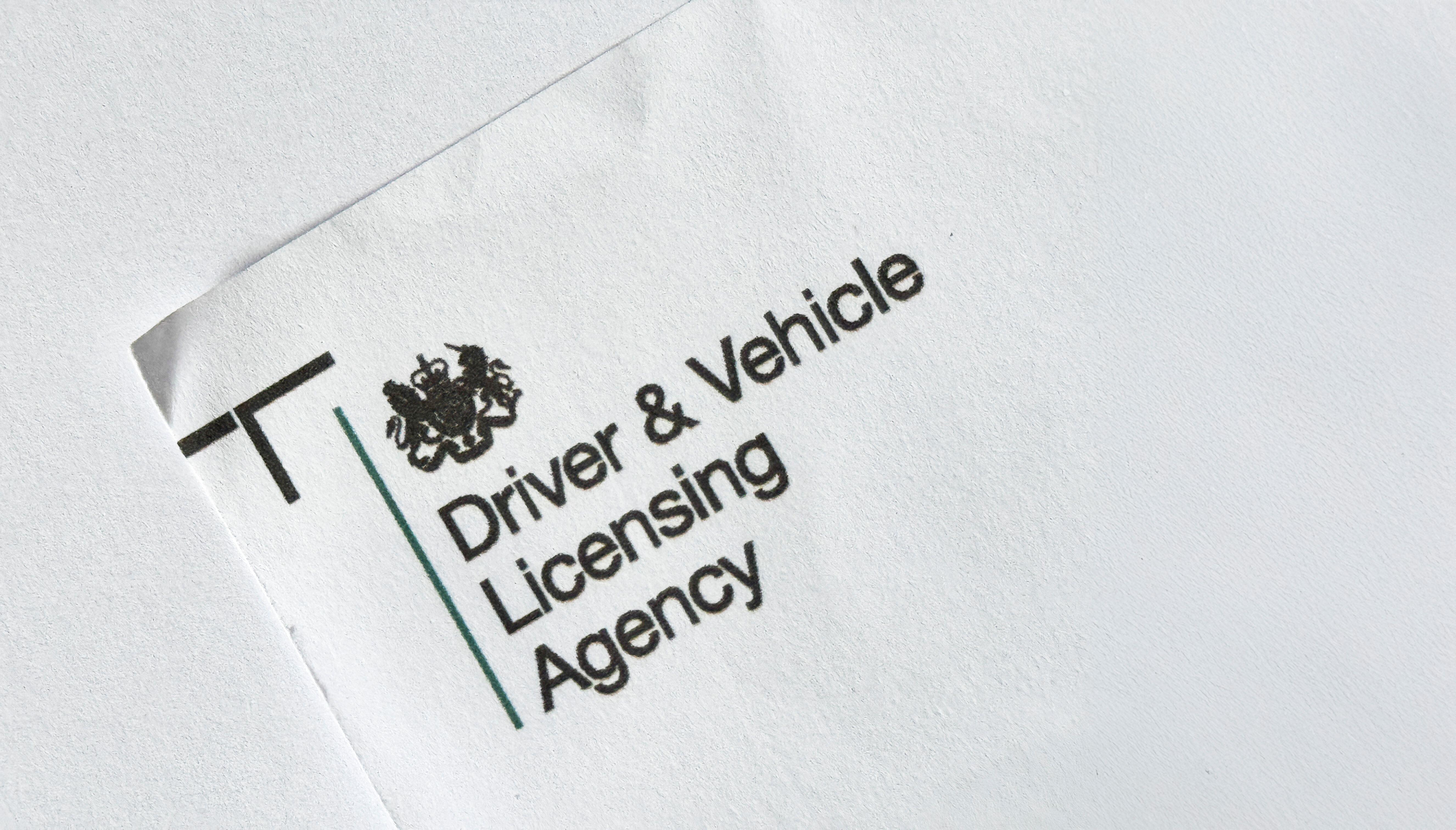 The logo for the Driving and Vehicle Licensing Agency on the corner of a leaflet