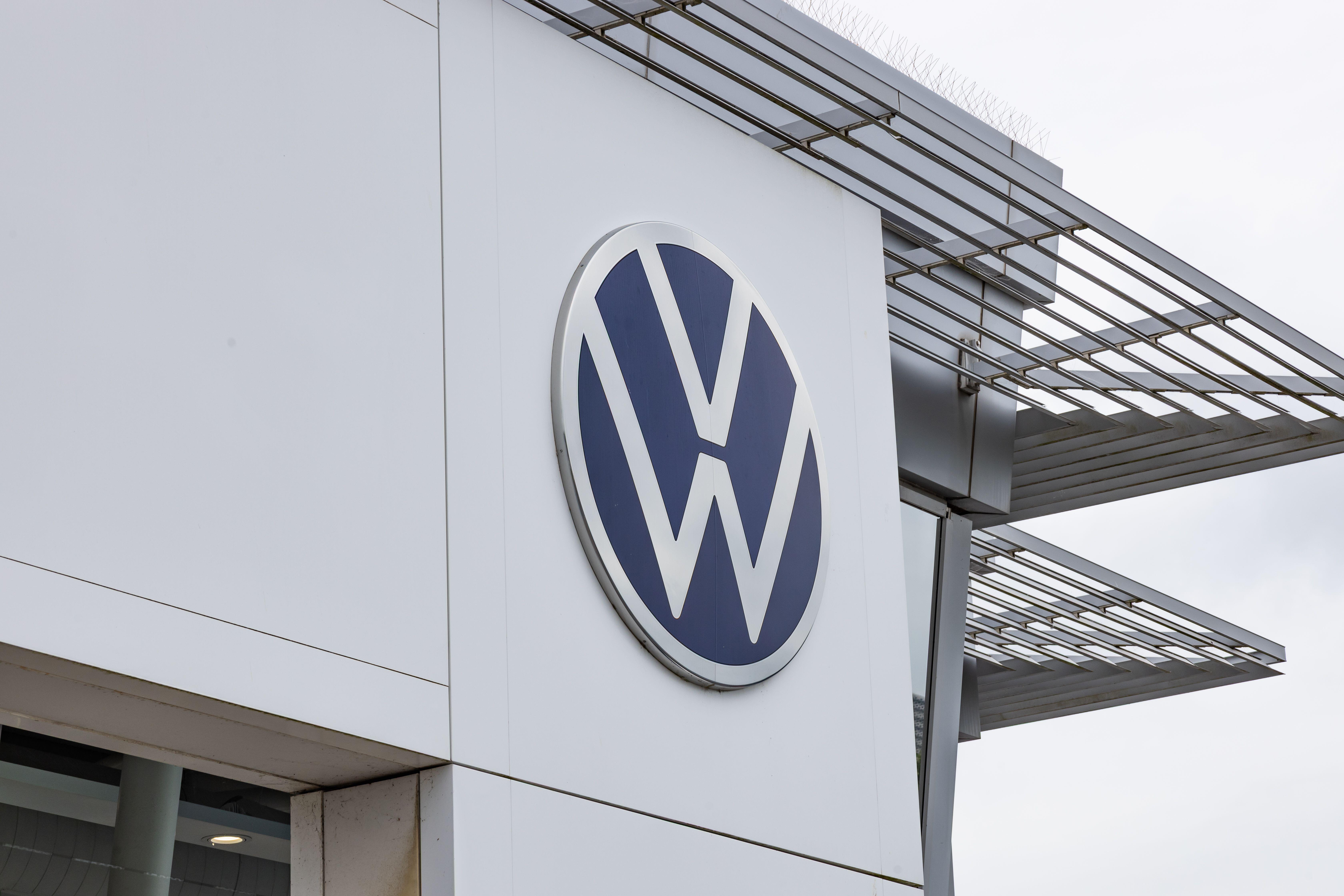 Volkswagen corporate logo on the exterior of a dealership building