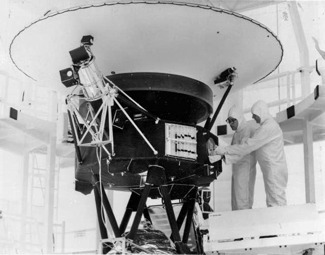 The 'Sounds of Earth' record being mounted on the Voyager 2 spacecraft