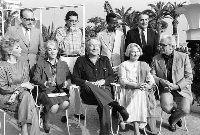 Jury members of the 36th international film festival posing together in Cannes on May 6 1983, from left, front: Italian actress Naria Angela Melato, French film critic Yvonne Baby, American novelist William Styron, Israeli movie fan Lys Van Leer and Russian director Serge Bondartchouk. Standing, from left, are: French producer Gilbert de Goldschmidt, Egyptian director Youssef Chahine, Malian director Souleymane Cisse and French art director Henri Alekan