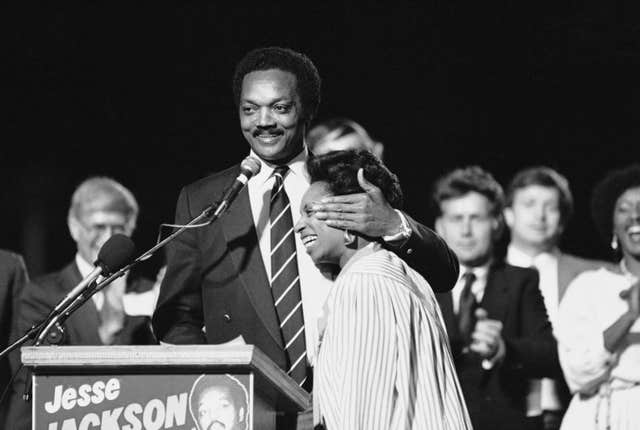 Jesse Jackson embraces his wife Jacqueline