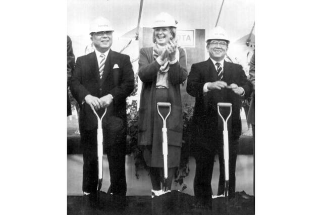 Kentucky governor Martha Layne Collins, centre, breaks into a large smile as does Toyota Motor Corporation chairman of the board Eiji Toyoda, left, and then-president Shoichiro Toyoda just after the three turned over the soil for the official groundbreaking ceremony near Georgetown, Kentucky, in 1986
