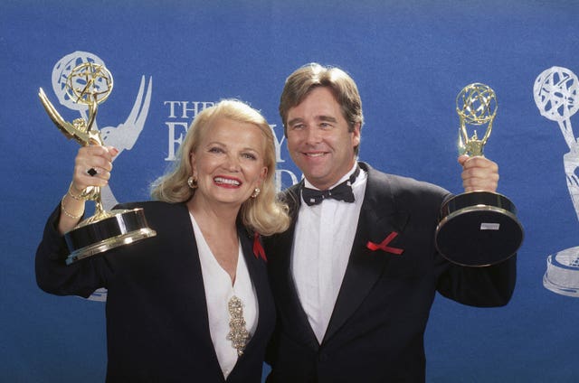 Gena Rowlands and actor Beau Bridges hold up their Emmys