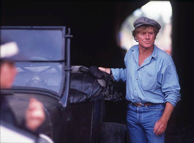 Robert Redford on set during the filming of A River Runs Through It in 1991