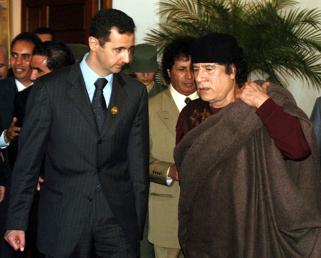 Bashar Assad and Muammar Gaddafi