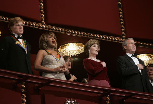 George W Bush, then-first lady Laura Bush, Robert Redford and Tina Turner in 2004