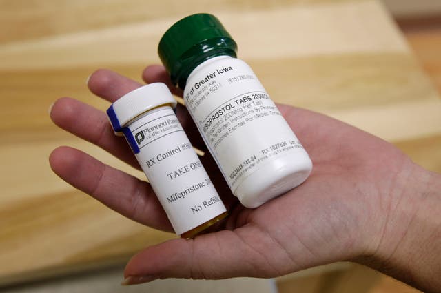 Bottles of abortion pills mifepristone, left, and misoprostol, right, at a clinic in Des Moines, Iowa