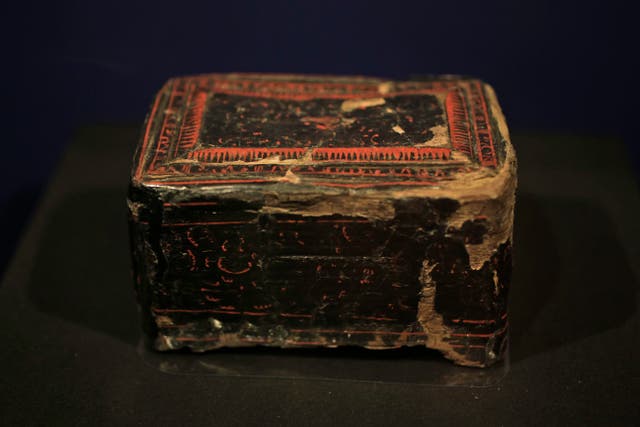A Chinese lacquer box from the first century AD is displayed as part of the exhibit called The Crimea - Gold And Secrets Of The Black Sea at Allard Pierson historical museum in Amsterdam on April 4 2014