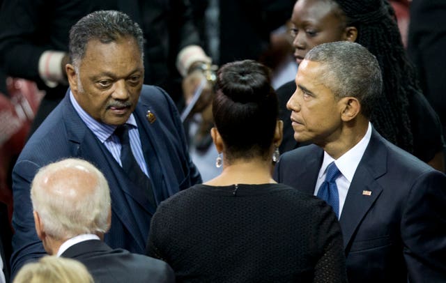 Rev Jesse Jackson talking to Joe Biden, Michelle Obama and Barack Obama