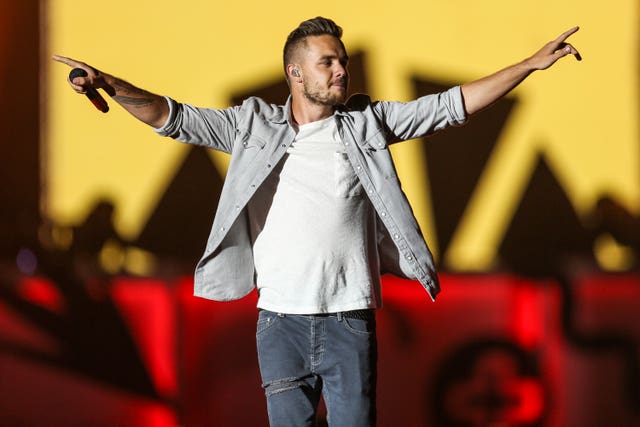 Liam Payne performing on stage