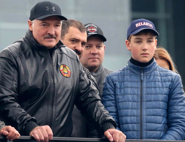 Alexander Lukashenko, left, with his sons Viktor, second from left, Dmitry, third from left, and Nikolai