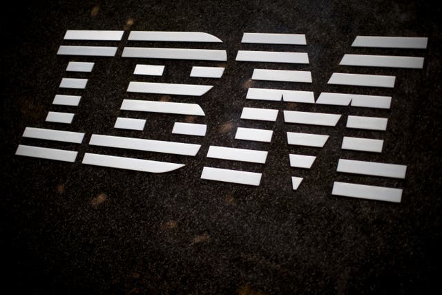 The IBM logo is displayed on the IBM building in Manhattan