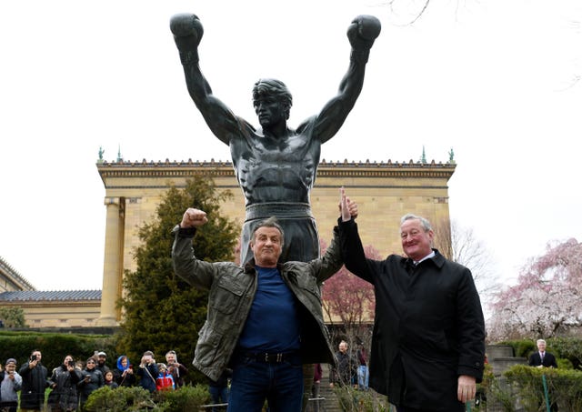 Sylvester Stallone poses with Philadelphia Mayor Jim Kenney in front of the Rocky statue at the Philadelphia Art Museum 