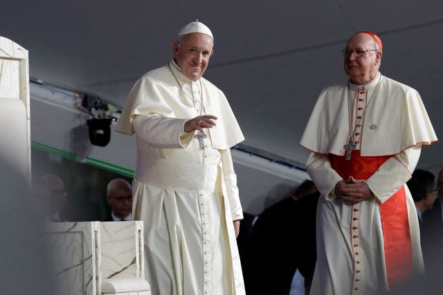 Pope Francis, left, with Cardinal Kevin Farrell during a vigil at Campo San Juan Pablo II in Panama City in January 2019 