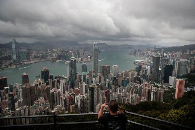 Hong Kong’s skyline and harbour are seen from Victoria Peak (Jae C Hong/AP)