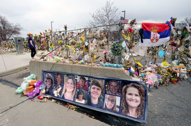 Tributes outside the supermarket following the mass shooting