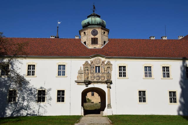 The gate and coat of arms at Glogowek Castle in Poland