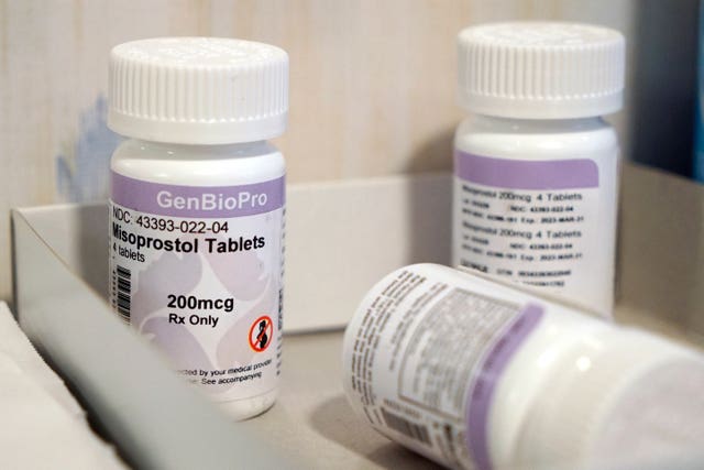 Bottles of the drug misoprostol sit on a table 