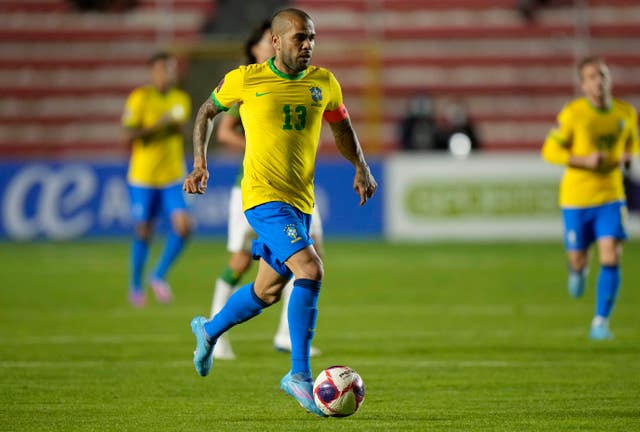 Alves controls the ball for Brazil against Bolivia in March 2022