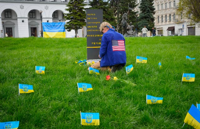 Ryan Wesley Routh pays tribute to foreign citizens killed during the Russia-Ukraine war in a central square in Kyiv, Ukraine, on April 30 2022