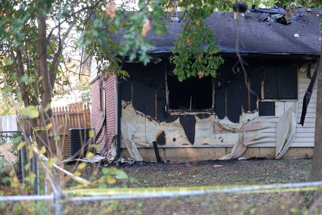 A room is seen at the back of a house in Broken Arrow, where the eight people died in an apparent murder-suicide
