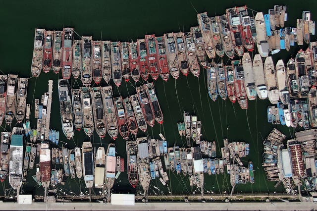 Fishing boats take shelter at a harbour as Typhoon Doksuri approaches the city of Chaozhou in southern China’s Guangdong Province