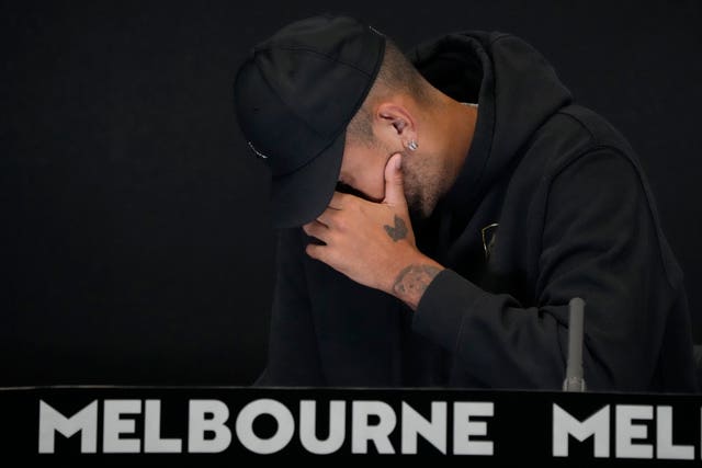 Australia’s Nick Kyrgios reacts as he announces his withdrawal from the Australian Open with a knee injury at a press conference in Melbourne, Australia on January 16, 2023