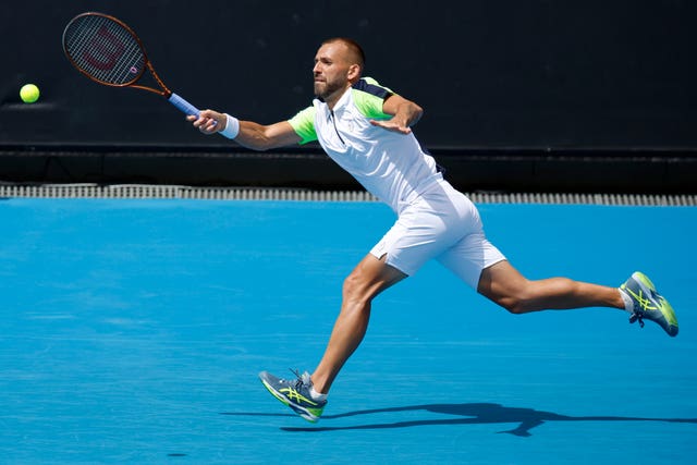 Dan Evans stretches for a forehand