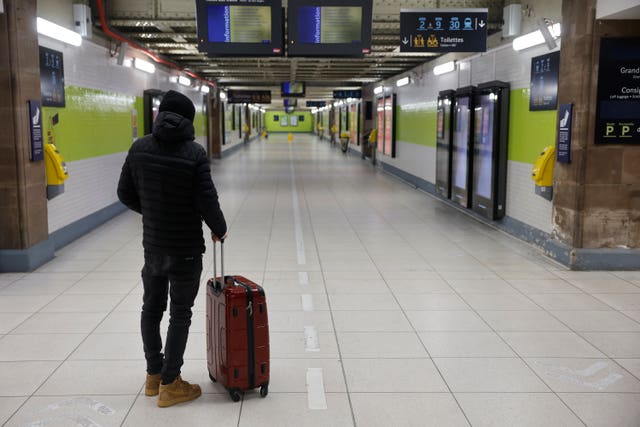 A man stands in a corridor of the closed train station in Strasbourg