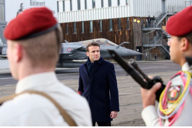 Macron reviews the troops before his New Year address