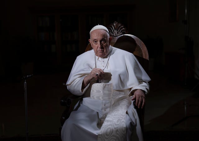 Pope Francis pauses during an interview with the Associated Press
