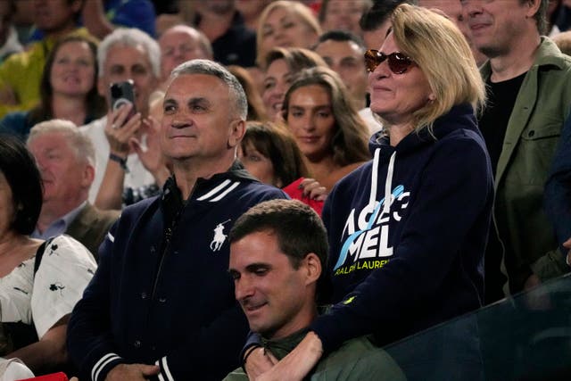 The parents of Novak Djokovic, father Srdjan and mother Dijana, in the stands at Melbourne Park 