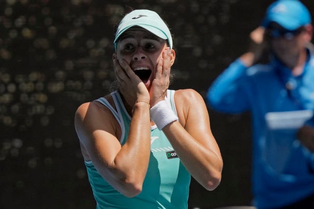 Magda Linette reacts with delight to her victory over Karolina Pliskova