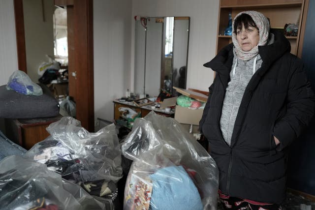Halina Panasian, 69, inside her destroyed house after a Russian rocket attack in Hlevakha