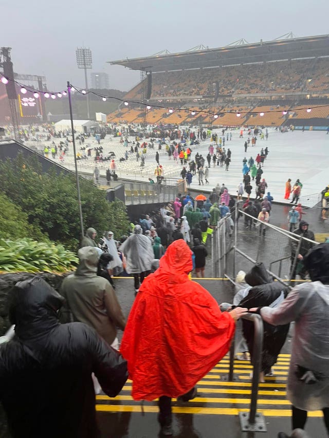 Fans leave Mt Smart Stadium in Auckland where about 40,000 people were expected to attend an Elton John concert 