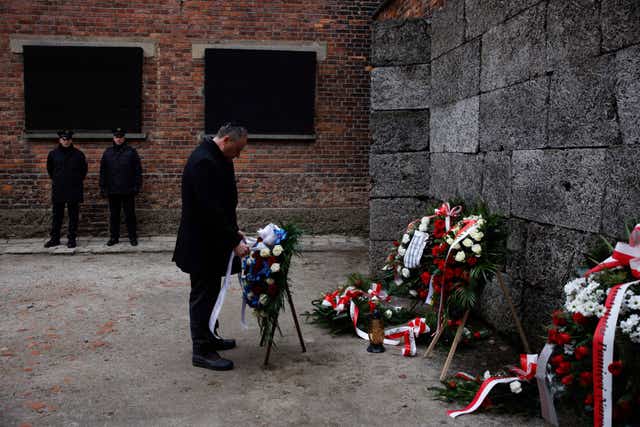 Second gentleman Douglas Emhoff lays a wreath during his visit to the former Nazi German concentration and extermination camp KL Auschwitz during ceremonies marking the 78th anniversary of the liberation of the camp in Oswiecim, Poland