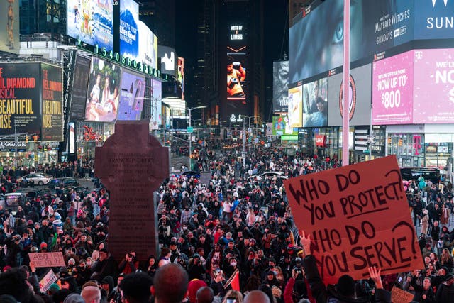Demonstrators gather during a protest in Times Square in response to the death of Tyre Nichols, who died after being beaten by Memphis police during a traffic stop
