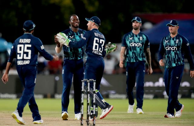 Jofra Archer celebrates a wicket with team-mates 