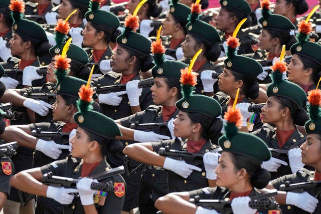 Soldiers march during the ceremony in Colombo 