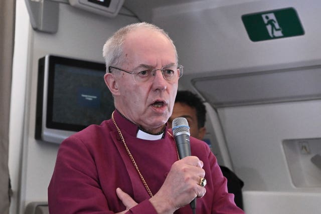 The Archbishop of Canterbury Justin Welby meets journalists during an airborne press conference aboard the plane directed to Rome, at the end of Pope Francis's pastoral visit to Congo and South Sudan
