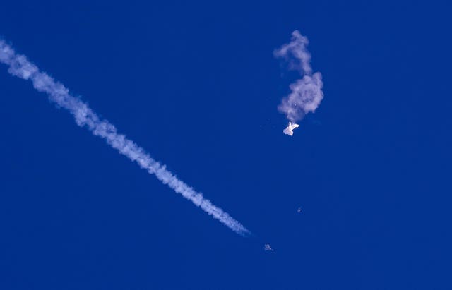 The remnants of the balloon drift above the Atlantic Ocean