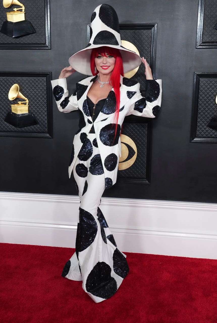 Shania Twain graces Grammys red carpet in cowprint inspired suit and
