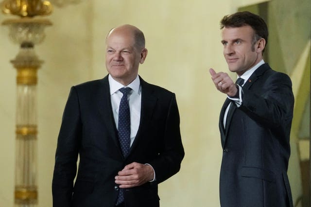 Emmanuel Macron with German Chancellor Olaf Scholz