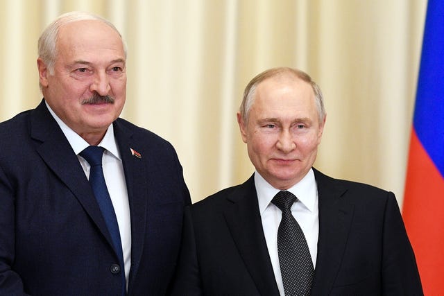 Russian President Vladimir Putin, right, and Mr Lukashenko pose for a photo prior to their talks at the Novo-Ogaryovo state residence, outside Moscow, Russia, in February 2023