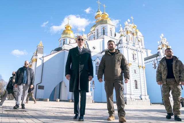 Joe Biden walks with Volodymyr Zelensky at St Michael’s Cathedral