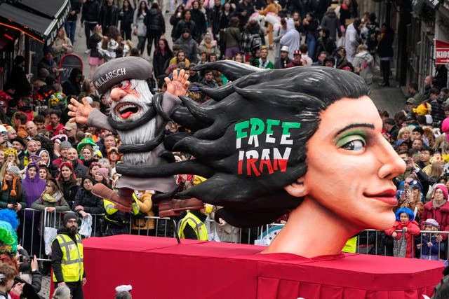 A carnival float depicts the fight for freedom in Iran during the traditional carnival parade in Duesseldorf