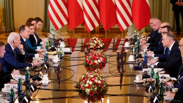 President Joe Biden, left, and Polish President Andrzej Duda, right, meet