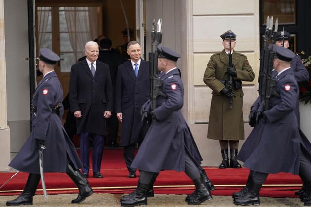 Polish President Andrzej Duda, right, welcomes President Joe Biden at the Presidential Palace in Warsaw 
