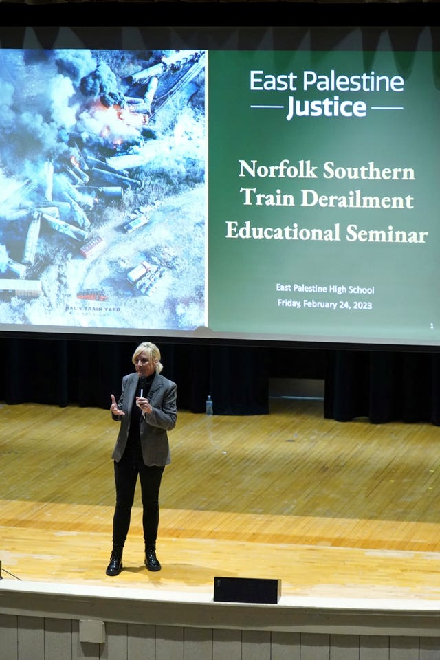 Activist Erin Brockovich speaks during a town hall meeting at East Palestine High School, Ohio